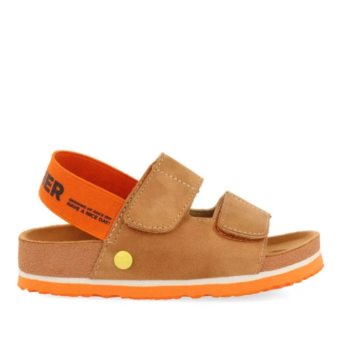 Courgis boys tan footbed sandals with orange details and text